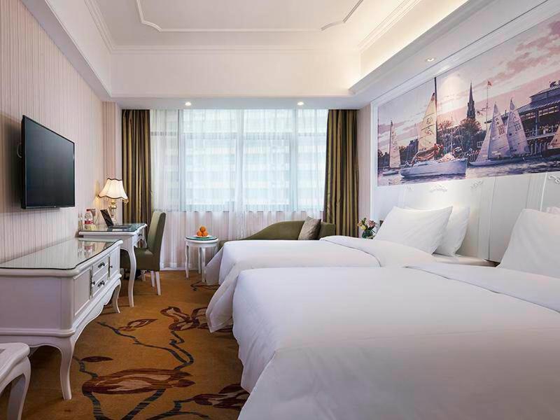 Vienna International Hotel Fenghua Zhongshan Road Exterior foto